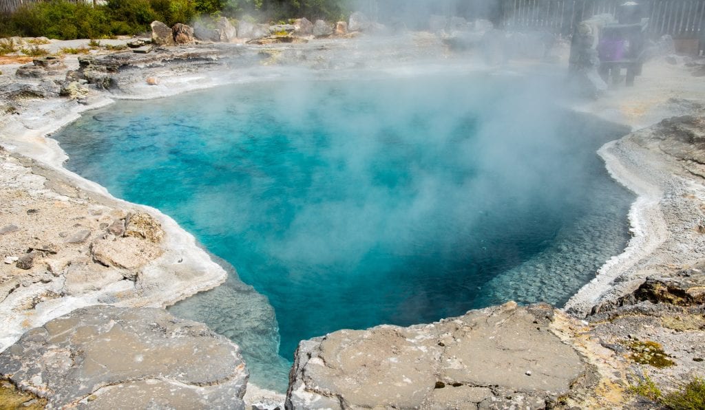 The beautiful turquoise hot spring called "Champagne Pool" in Whakarewarewa the living Maori village in Rotorua, New Zealand.